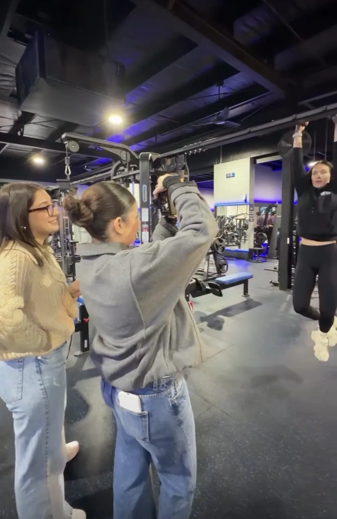 Filming a client at a gym