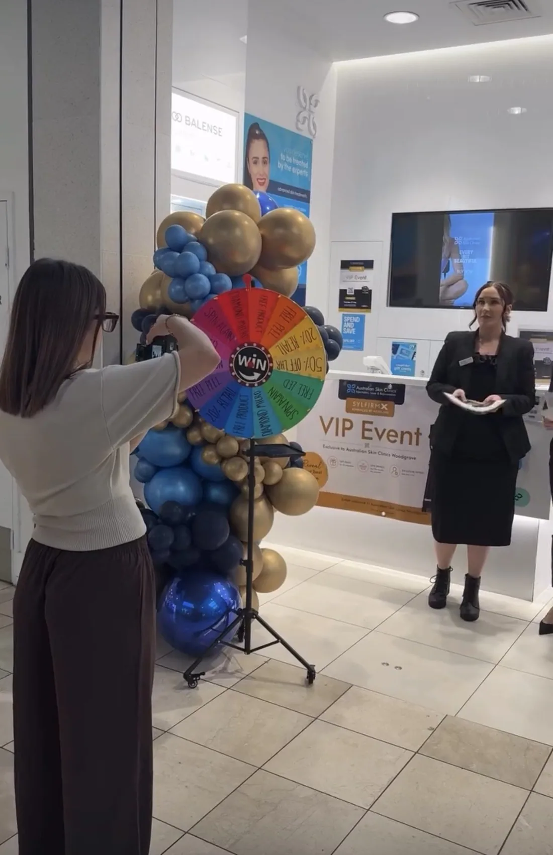Filming at a VIP event with a prize wheel